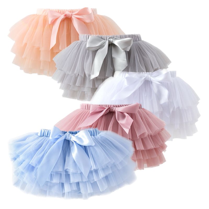 Explore the world of Dear Pastel with our delightful collection of Baby Toddler Girl's Tutu Skirts. This image showcases five charming color variants – Baby Blue, Pale Rose, French Grey, White, and Apricot. Each tutu comes with an adorable headband, and the super-soft, comfortable fabric ensures your baby's sensitive skin is always pampered.